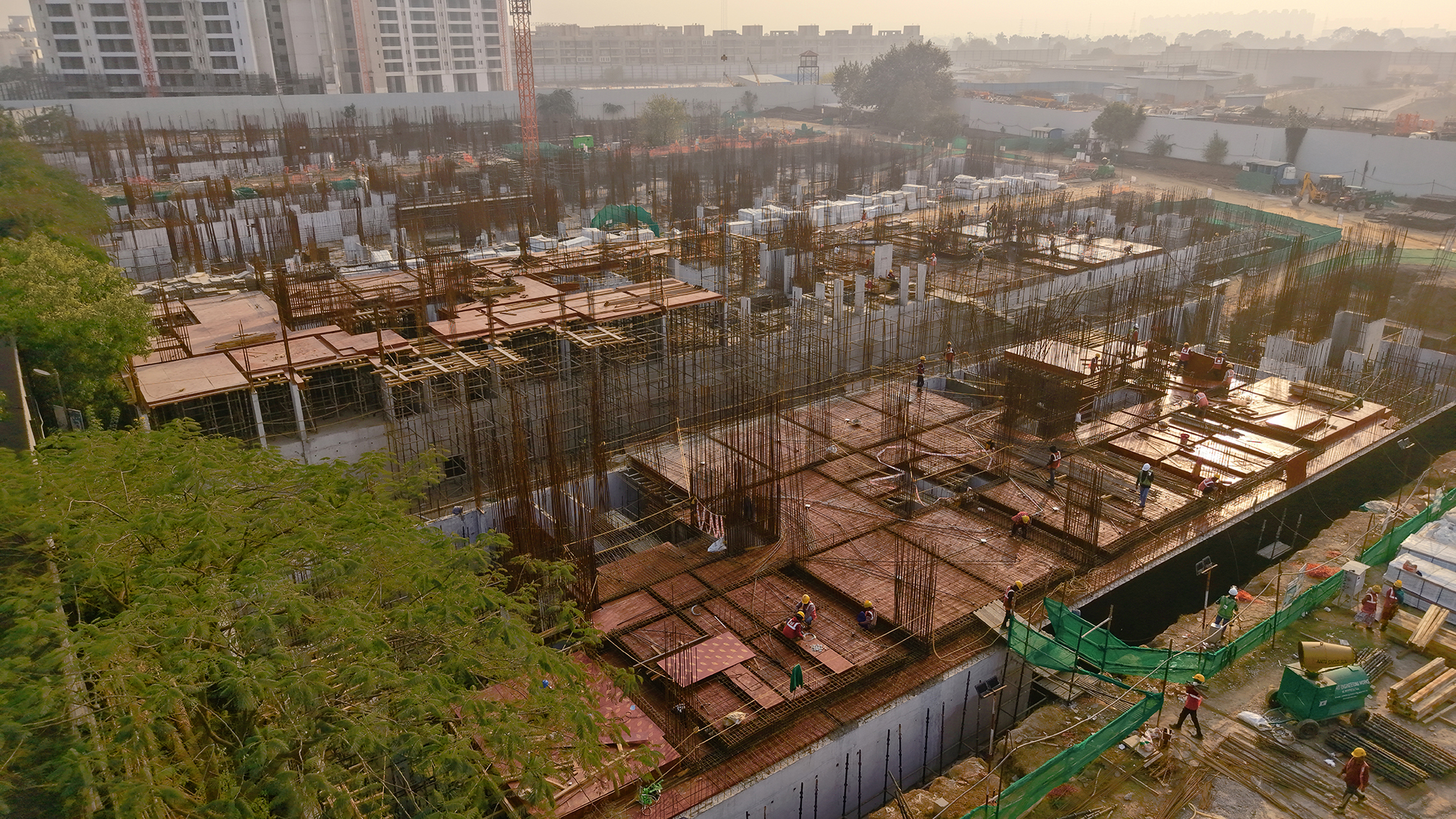 Foundation, retaining wall, column basement slab, stilt roof slab work in progress.