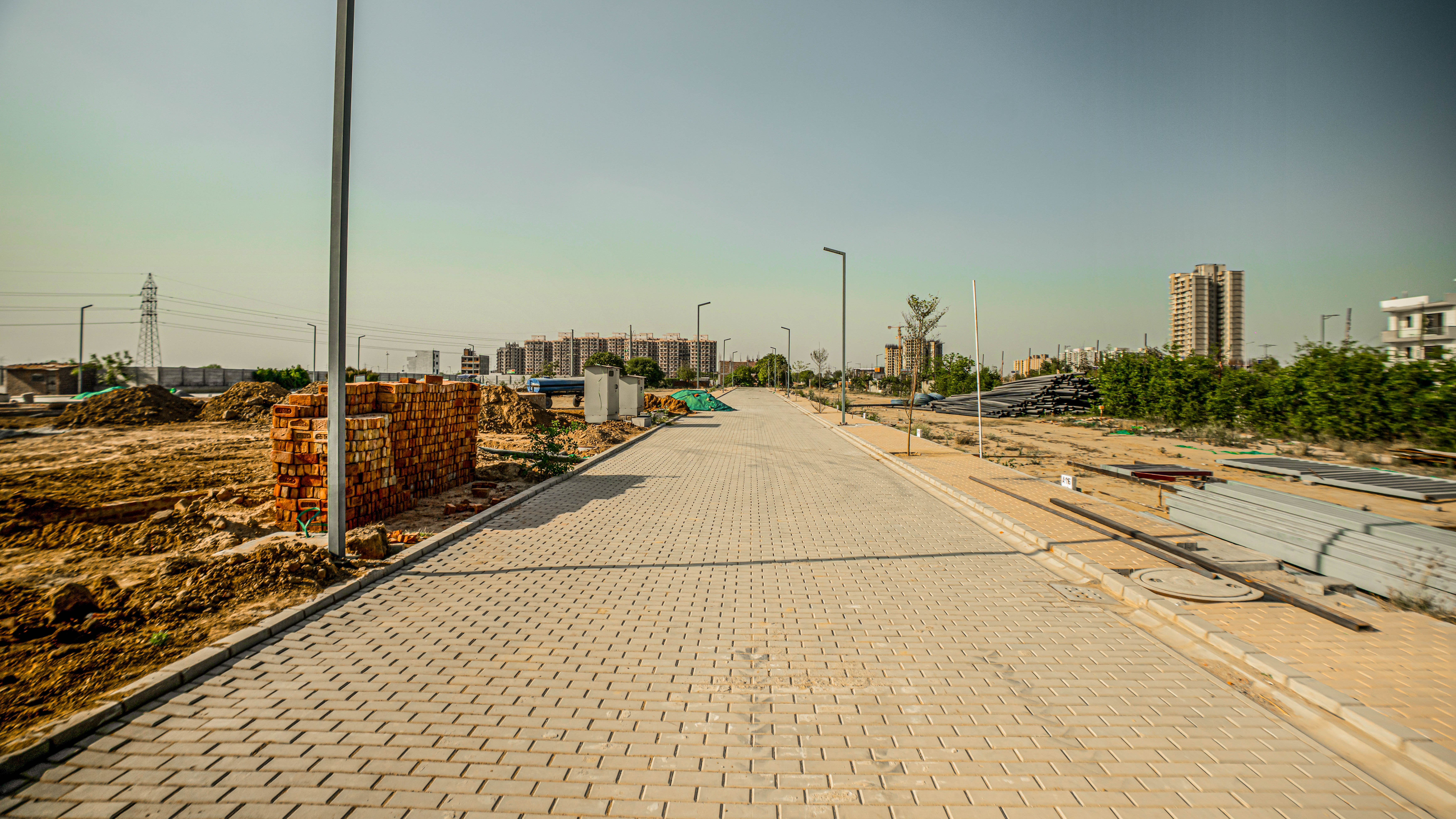 Road works at completion stage, Peg marking ongoing