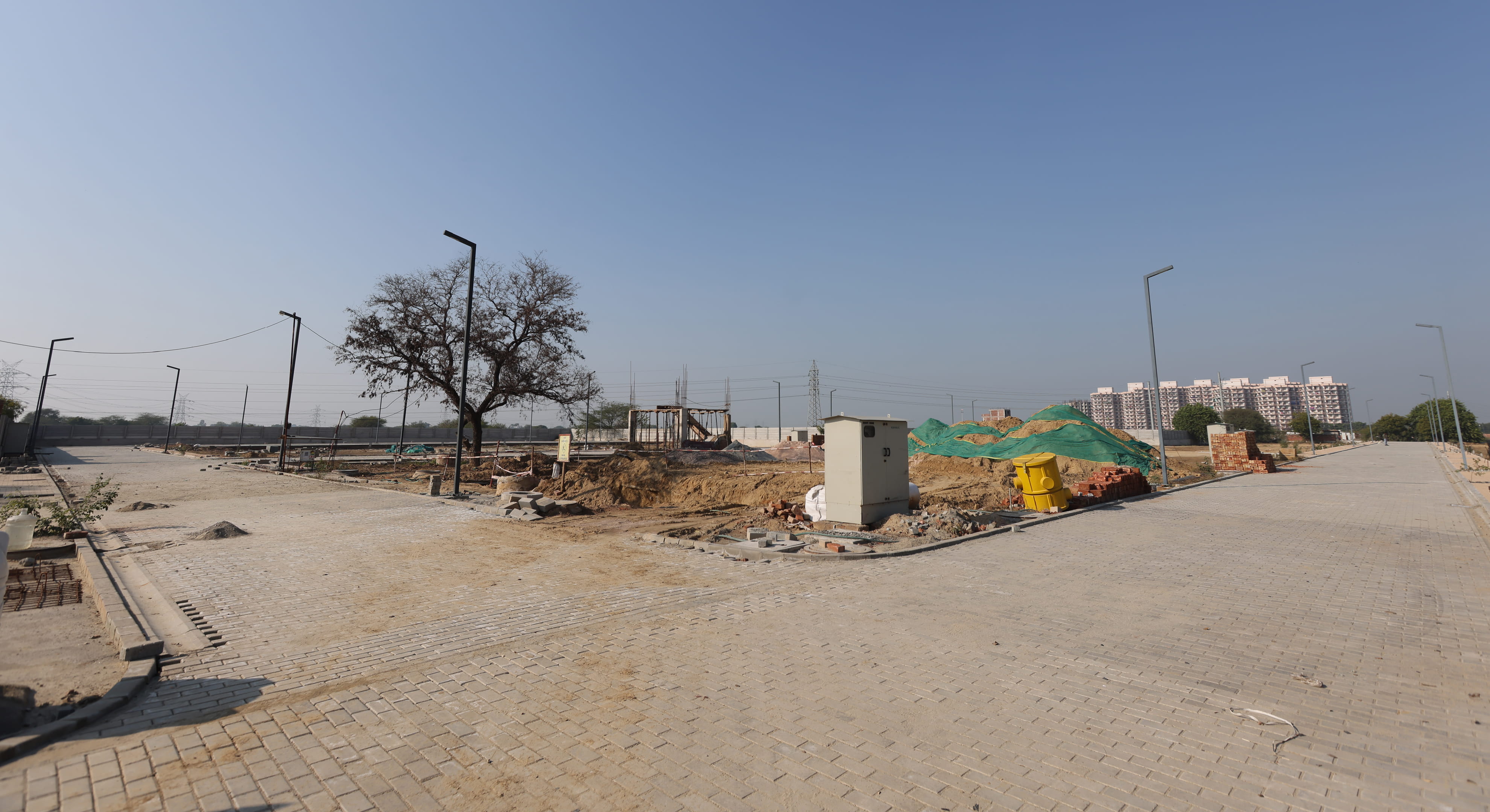Filling Work & Boundary Wall Completed, Road Works at completion Stage, STP & WTP civil works at completion stage, Utilities & Services at completion Stage