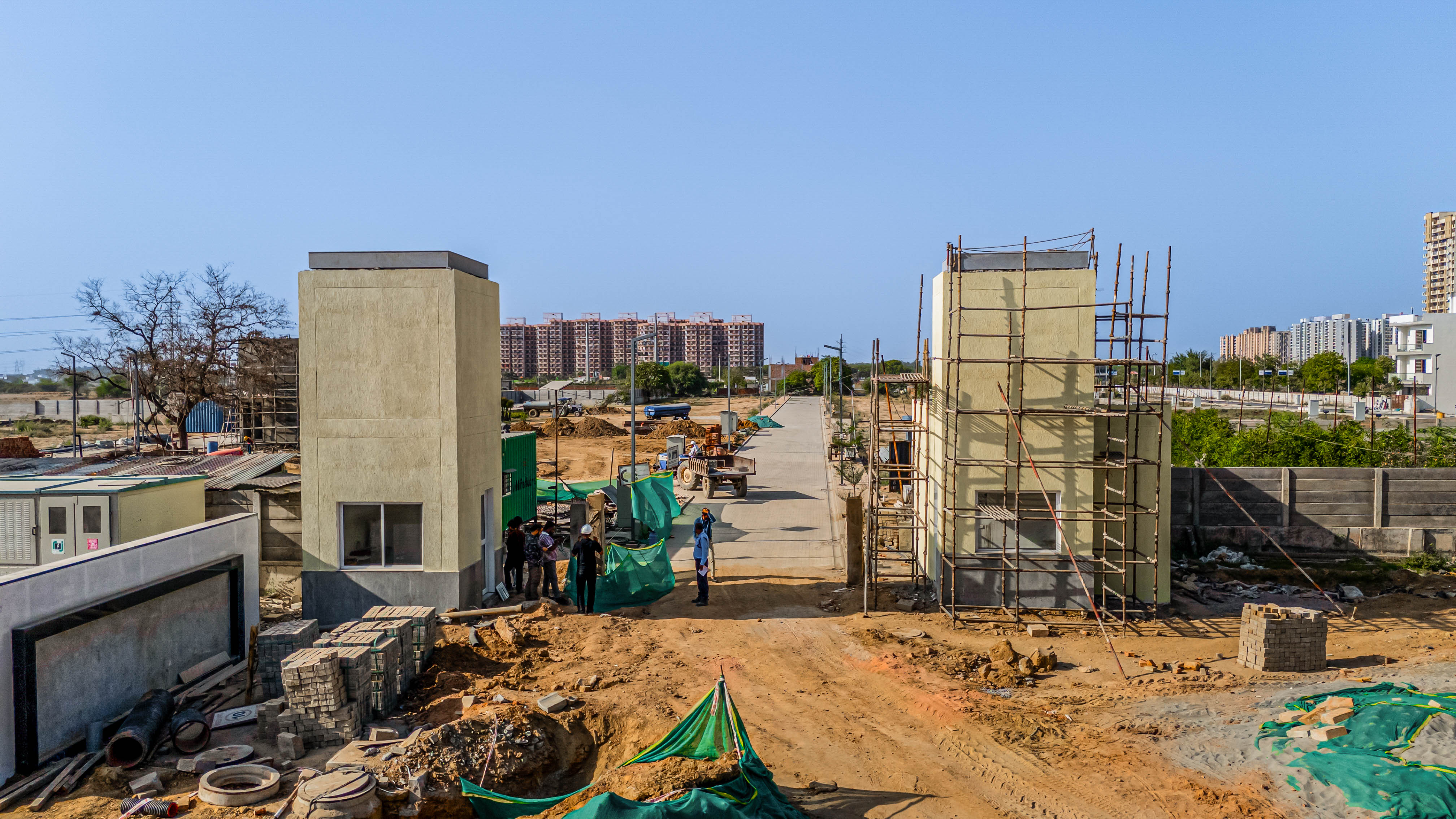 Filling work completed, Boundary wall completed, Road works at completion stage